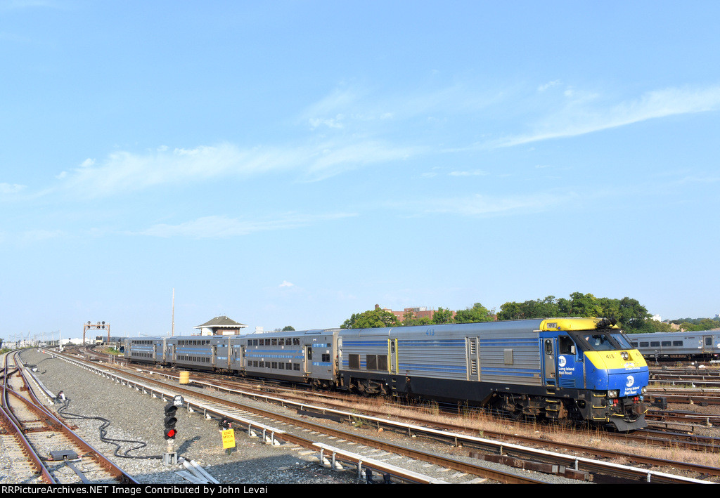 LIRR Train # 6508 entering the station with DE30AC # 413 on the point 